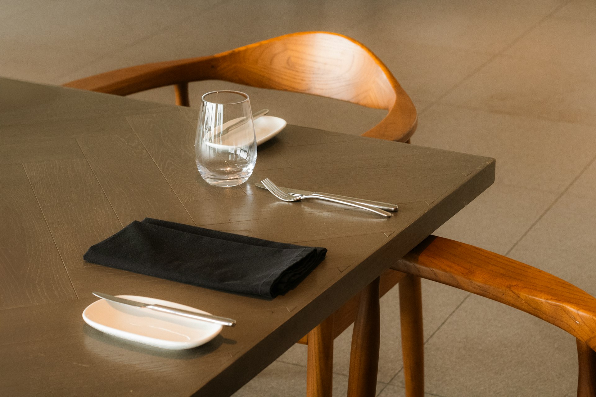 Restaurant table is set for a meal.